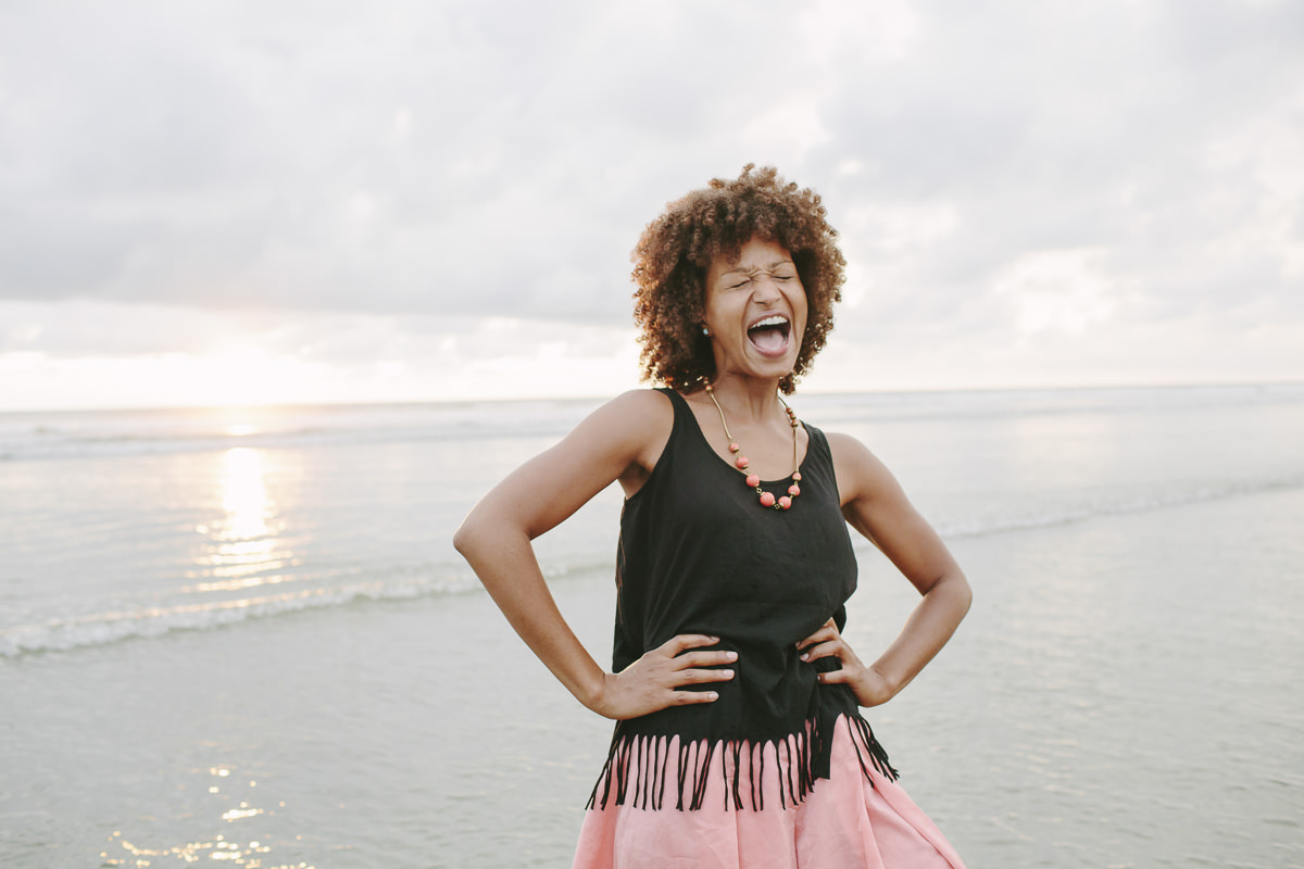 Portrait of musician Nely Daja by the ocean