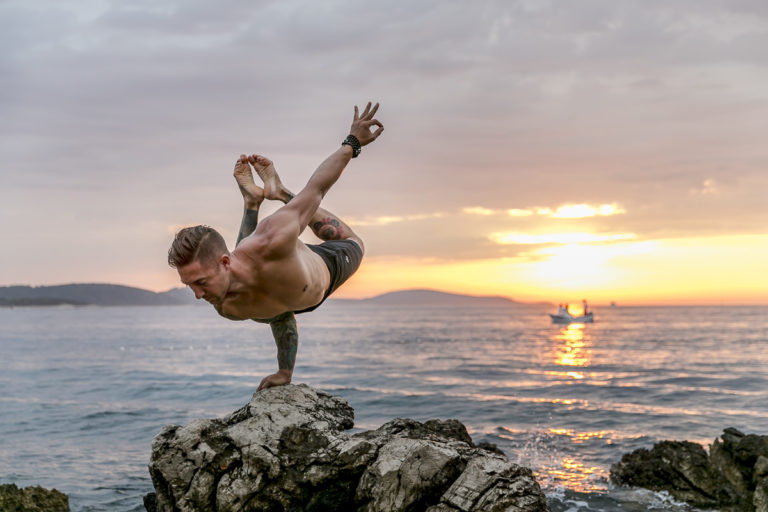 Yoga-portrait-Dylan-Werner-01 yoga portrait of yoga teacher dylan werner at sunset by the sea