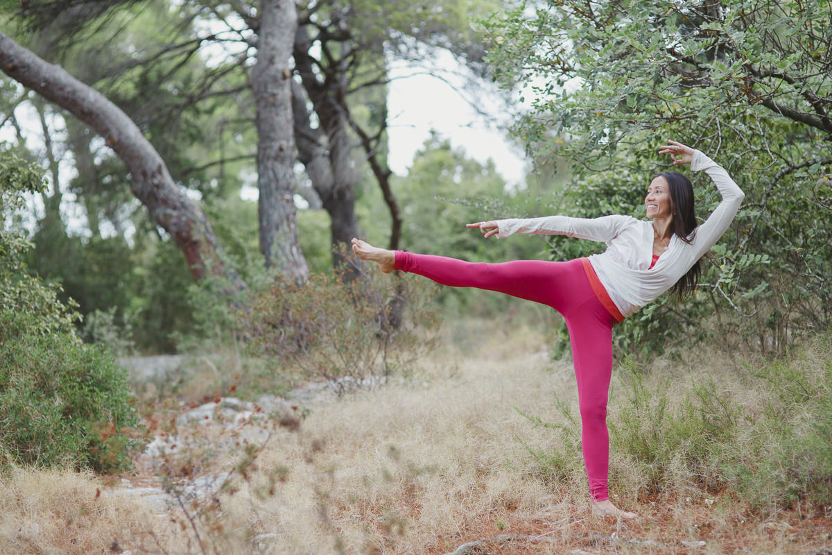 Yoga portrait of Twee Merrigan striking a yoga pose