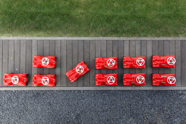 aufgereihte Bobby Cars als Imagefoto für Babyone